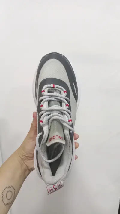 Lacoste gris y blanco - miniatura 1