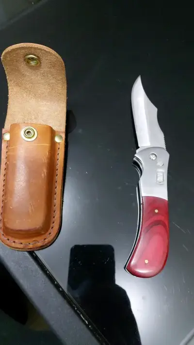 Cuchillo plegable con funda de cuero - miniatura 2