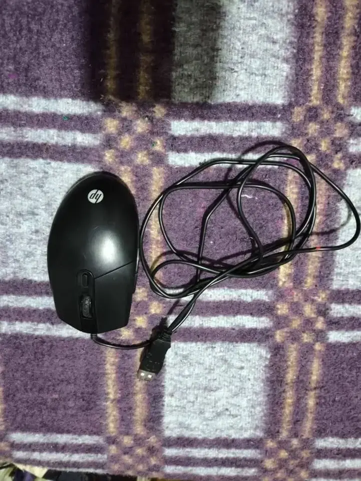 Mouse HP con cable USB en buen estado optico