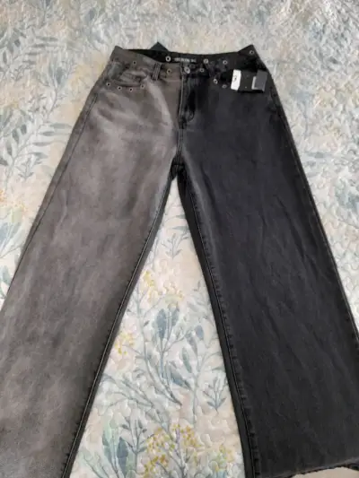 Jeans bicolor de mezclilla con ojales - miniatura 1