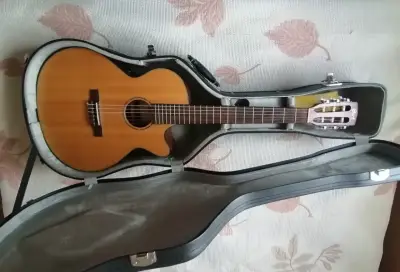 Guitarra Cort electroacústica c / nylon con case - miniatura 1