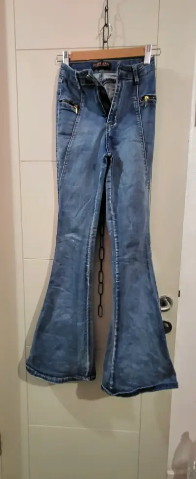 Jeans acampanados de mezclilla azul - miniatura 1
