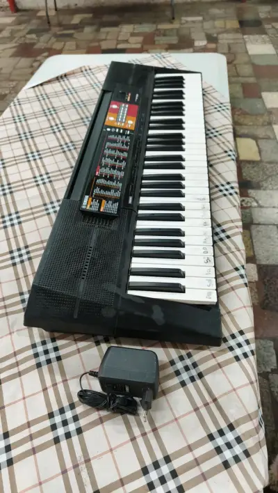 Teclado Yamaha con Adaptador Original - miniatura 1