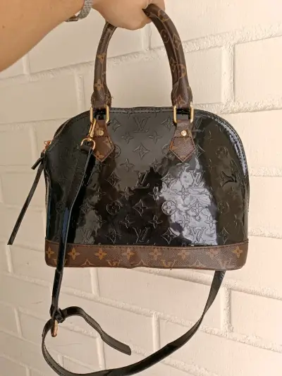 Bolso de mano Louis Vuitton negro y marrón - miniatura 1