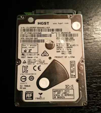 Disco duro HGST 500GB SATA 2.5" - miniatura 1