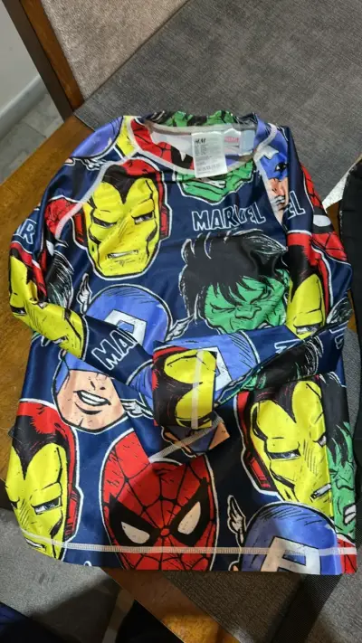 Polera manga larga azul y naranja para surf - miniatura 2