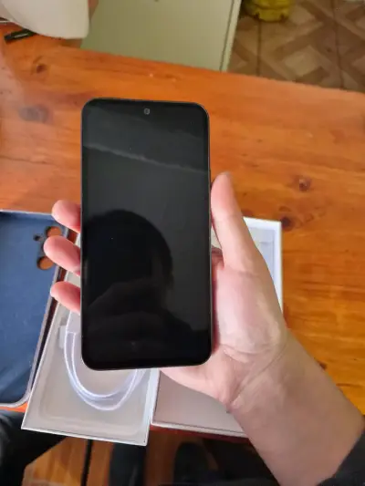 Samsung A54 5g con sus accesorios - miniatura 1