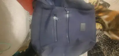 Mochila azul Dagne Dover con bolsillos - miniatura 1