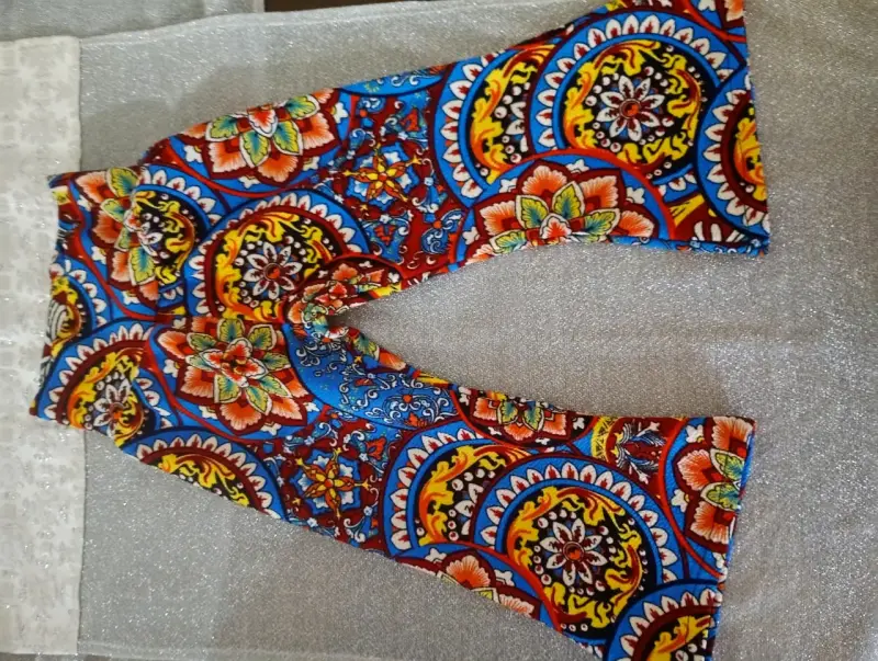 Pantalones infantiles rosa y azul con volantes - 6