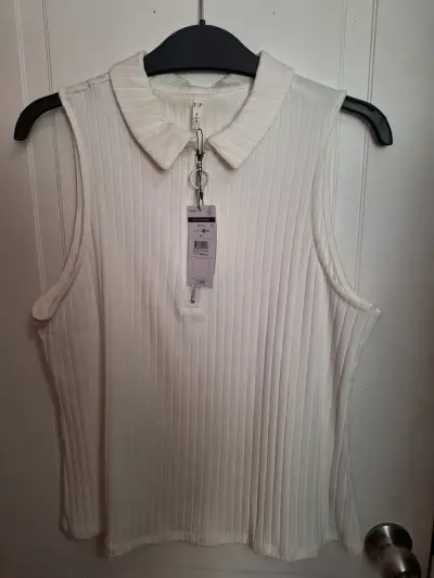 Polera sin mangas blanca con cuello - miniatura 1