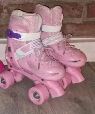 Patines rosados para niña con ruedas ajustables