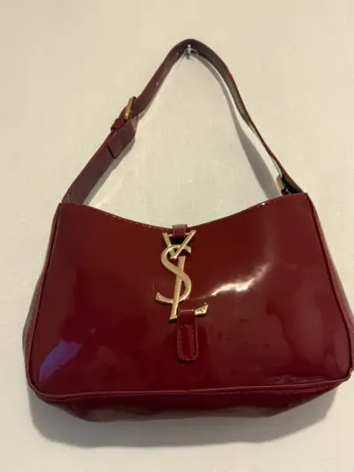 Cartera de cuero burdeos con logo dorado - miniatura 1
