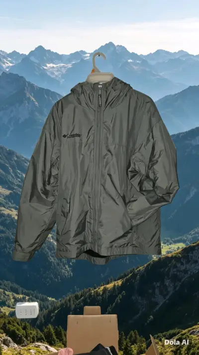 Chaqueta impermeable Columbia gris con capucha - miniatura 1