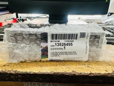 Luz de placa GM Onix STD nueva - miniatura 1