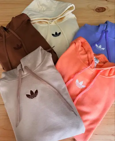 Polerones unisex con capucha y logo bordado - miniatura 1