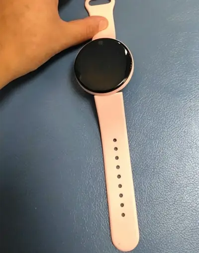 Smartwatch rosa con pantalla táctil - miniatura 2