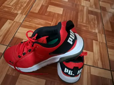 Zapatillas deportivas Puma rojas para hombre - miniatura 1