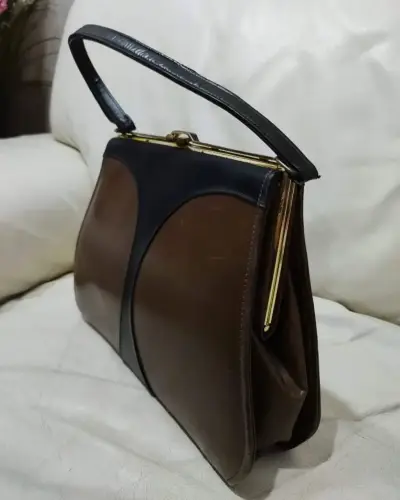 Cartera de cuero marrón elegante - miniatura 1