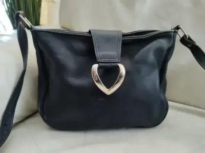 Cartera de cuero azul con cierre metálico - miniatura 1