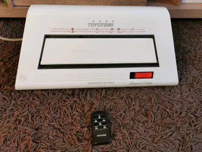 Calefactor Toyotomi Bianco Clima con control remoto - miniatura 1