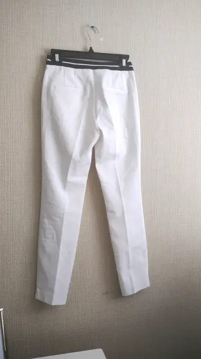 Pantalones blancos elegantes para mujer - miniatura 2