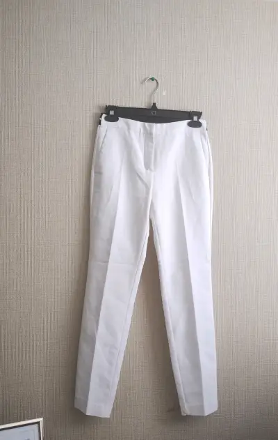 Pantalones blancos elegantes para mujer - miniatura 5