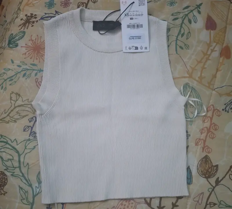 Top sin mangas blanco de punto