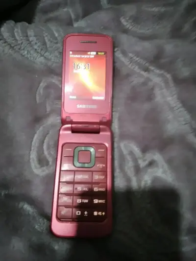 Celular Samsung plegable rojo en buen estado - miniatura 1