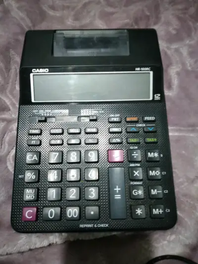 Calculadora Casio HR-100RC con impresora - miniatura 1