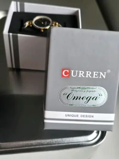 Reloj Curren dorado y negro elegante - miniatura 2