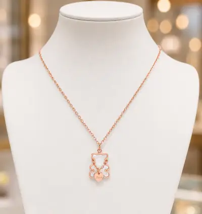 Collar de oso en oro rosa con dije de corazón - miniatura 1