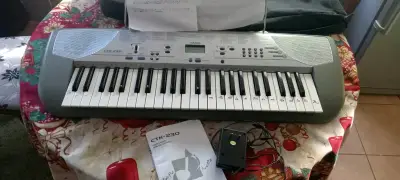 Teclado Casio CTK-230 con accesorios - miniatura 3