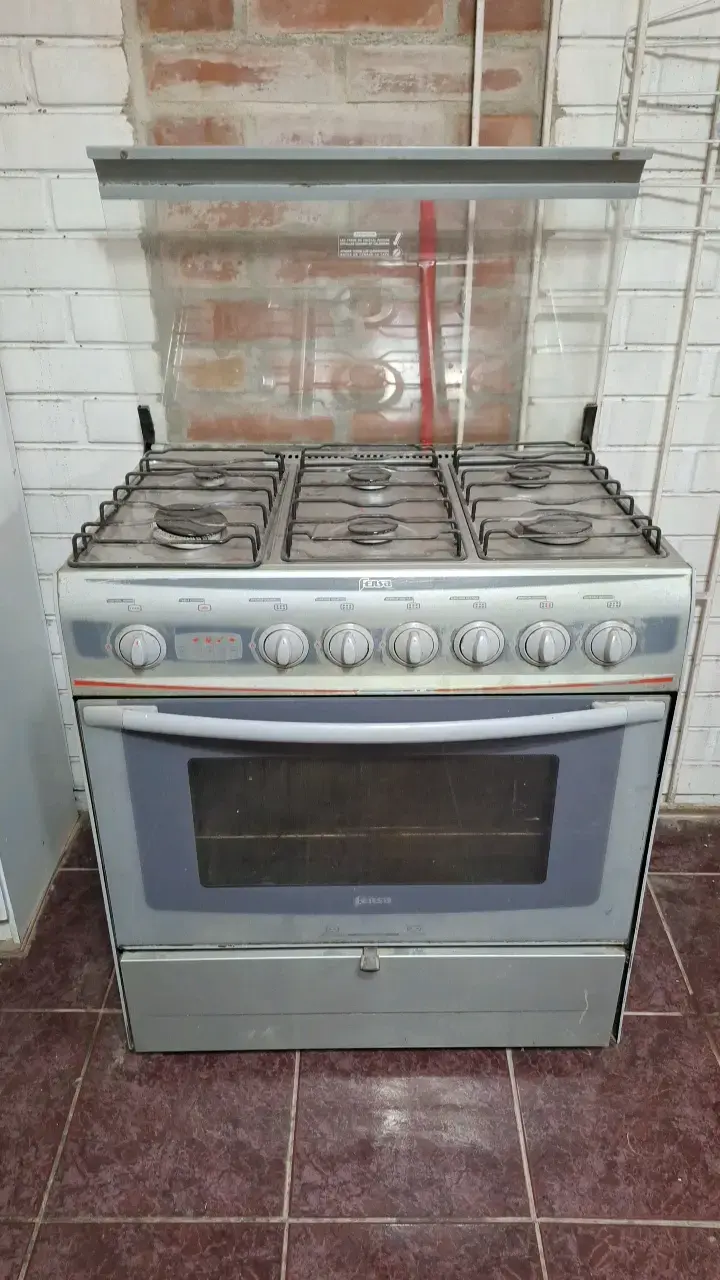 Cocina a gas Fensa con horno integrado