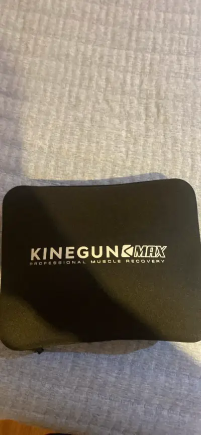 Pistola de masaje KineGun Max para recuperación - miniatura 1