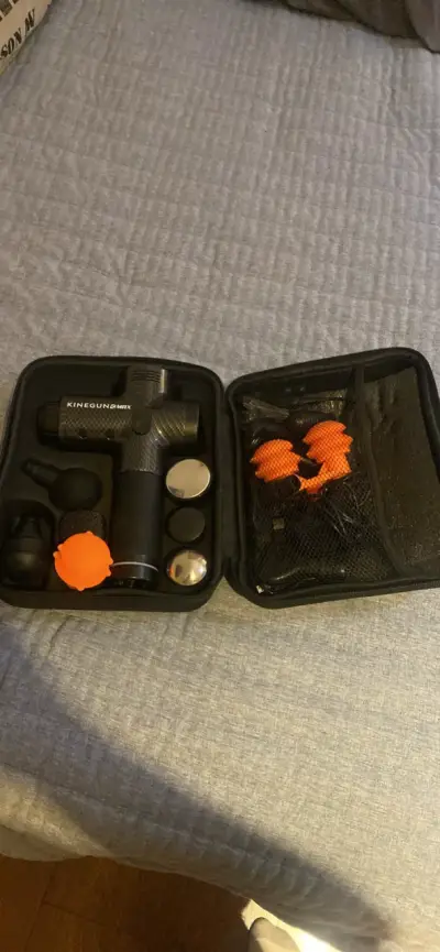 Pistola de masaje KineGun Max para recuperación - miniatura 2