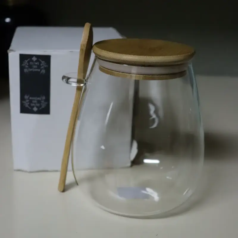 Frasco de vidrio con tapa y cuchara de bambú. - 1