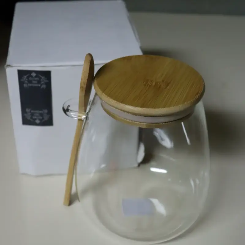 Frasco de vidrio con tapa y cuchara de bambú. - 2