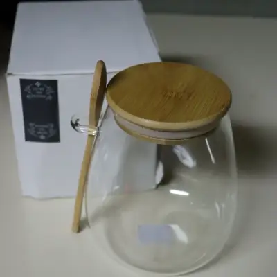 Frasco de vidrio con tapa y cuchara de bambú. - miniatura 2