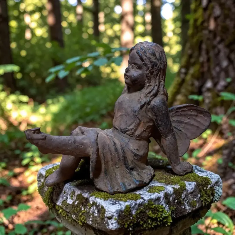 Estatua de hada de jardín en metalica