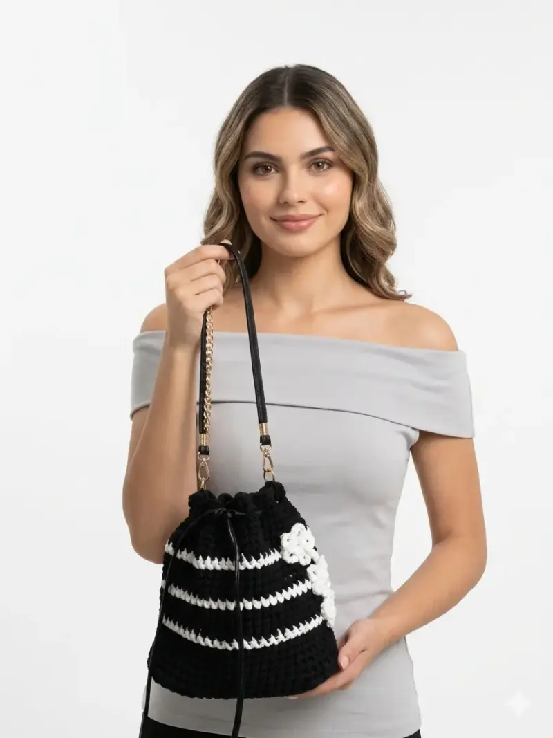 Bolso de crochet blanco y negro elegante