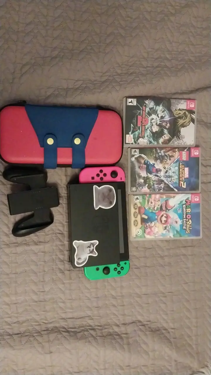Consola Nintendo Switch con juegos y accesorios