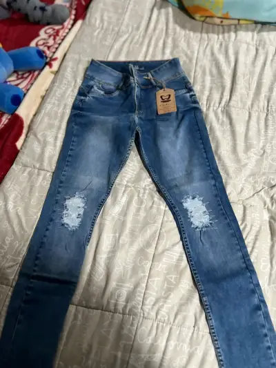 Jeans azul desgastado para mujer - miniatura 1