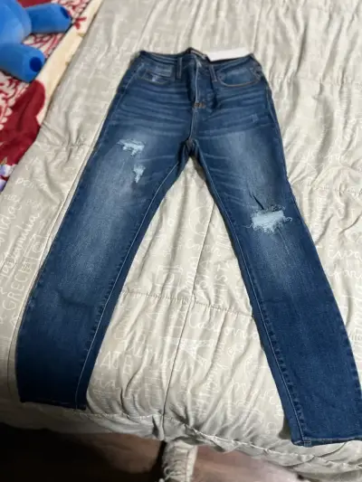 Jeans azul desgastado para mujer - miniatura 1