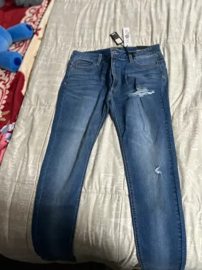 Jeans azul desgastado para hombre - miniatura 1