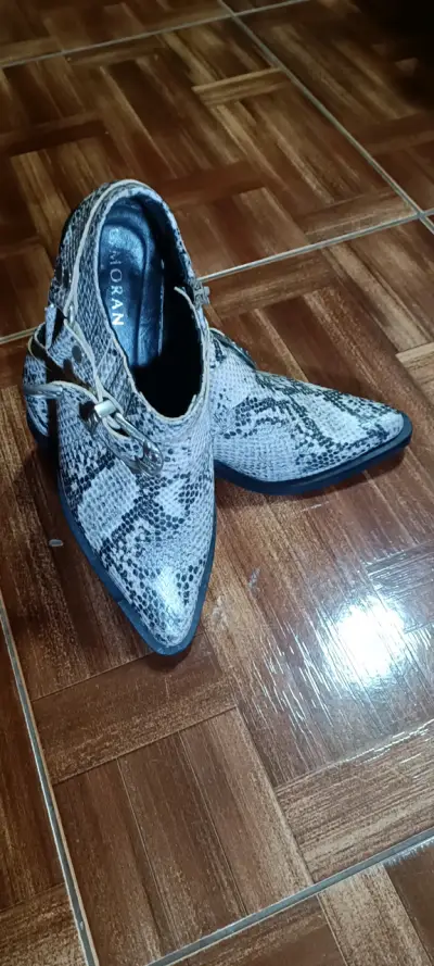 Botines de cuero con diseño de serpiente - miniatura 1