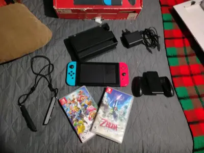 Consola Nintendo Switch con juegos y accesorios - miniatura 1