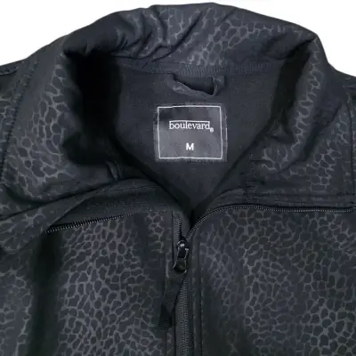 Chaqueta negra con diseño animal print - miniatura 3