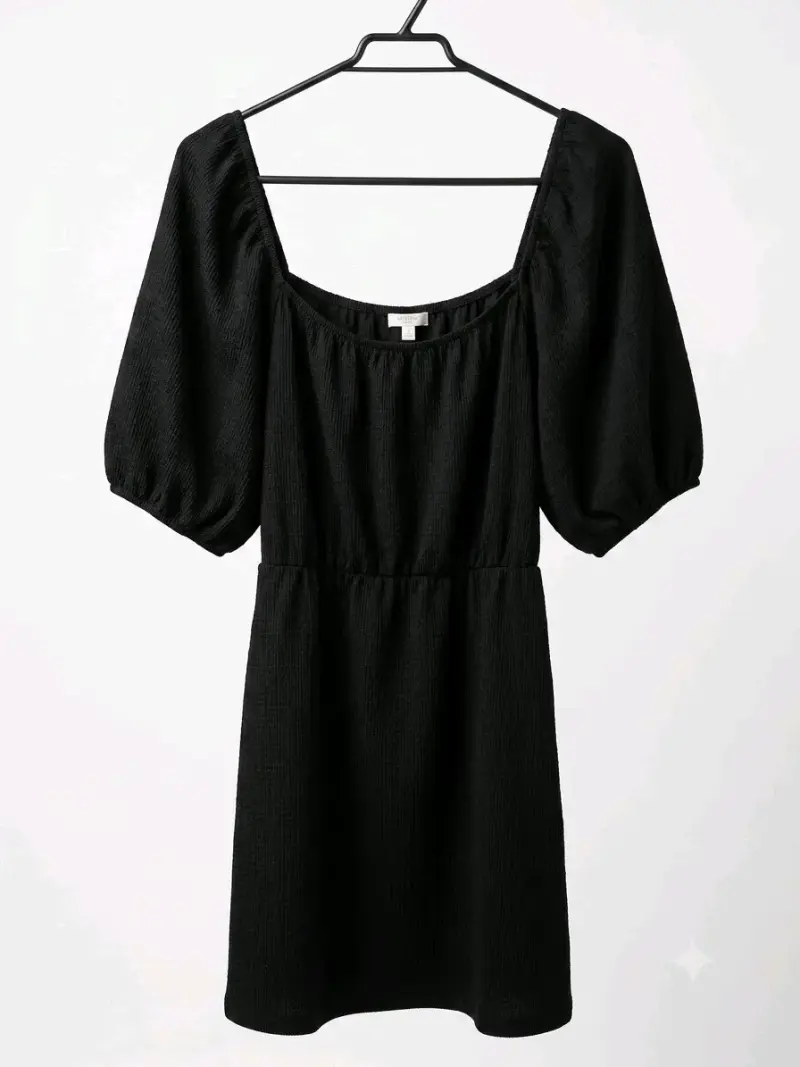 Vestido negro con mangas abullonadas - 1