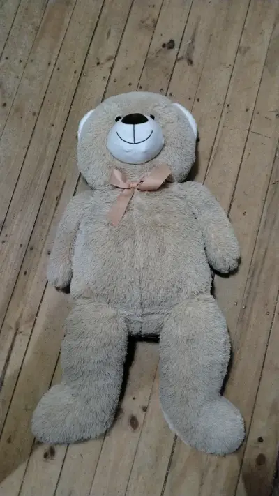 Osito de peluche gigante beige con lazo - miniatura 1