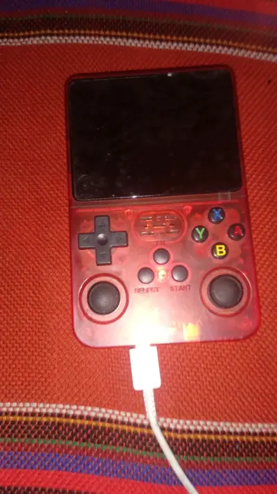 Consola de juegos portátil R36S naranja - miniatura 4